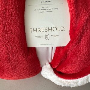 NWT Threshold Red and White Plush Reversible Throw 50” x 60” never used.
